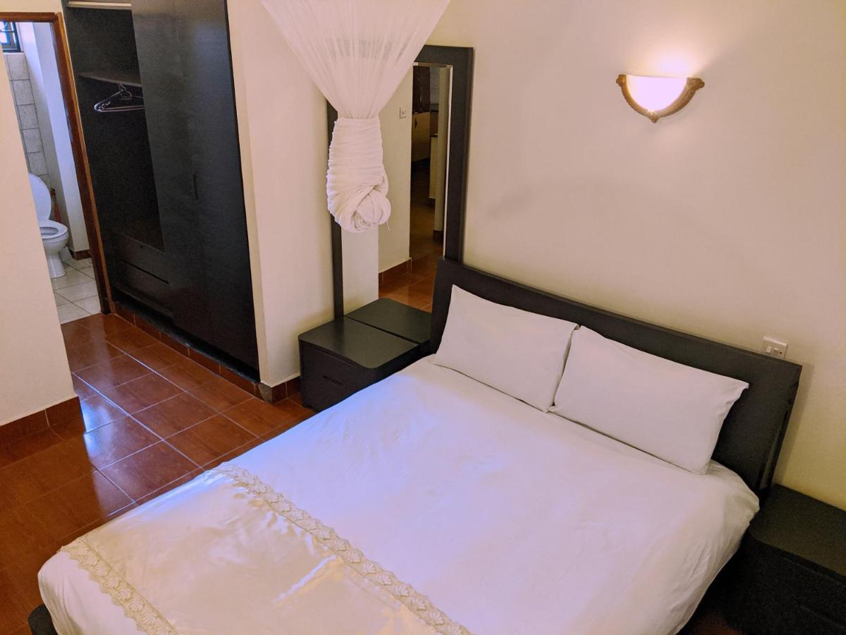 Prestige Hotel Suites Кампала Экстерьер фото