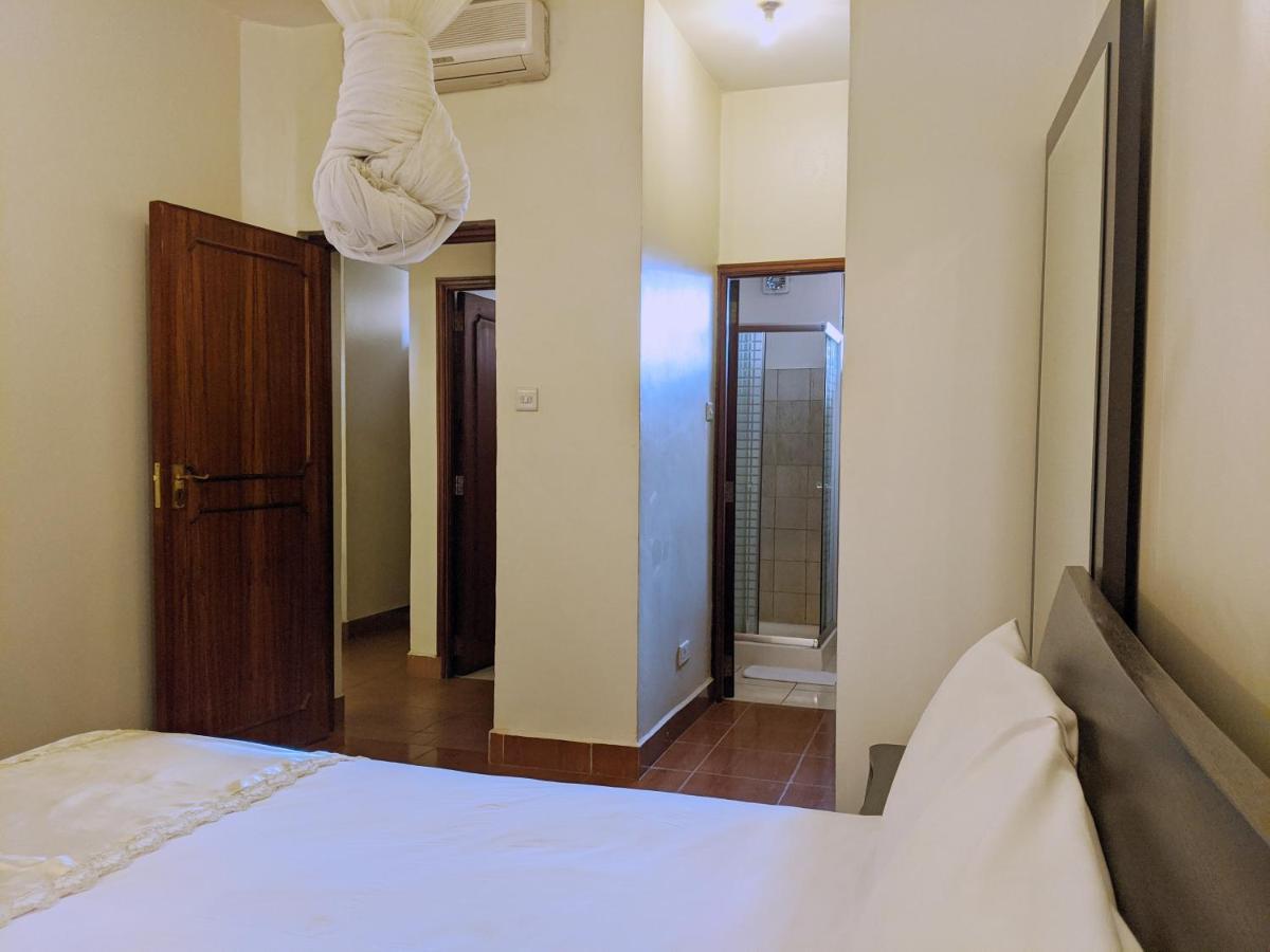 Prestige Hotel Suites Кампала Экстерьер фото