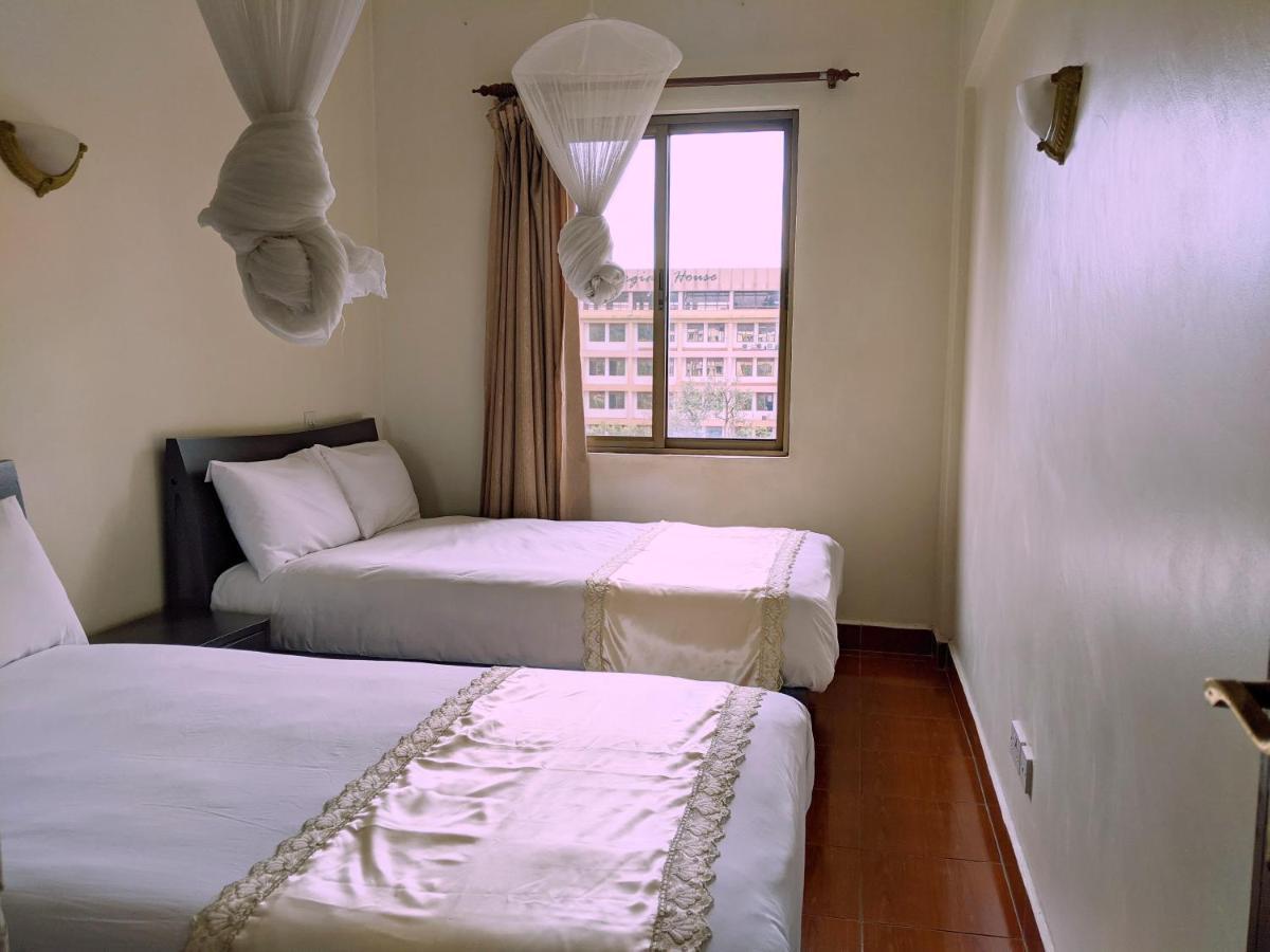 Prestige Hotel Suites Кампала Экстерьер фото