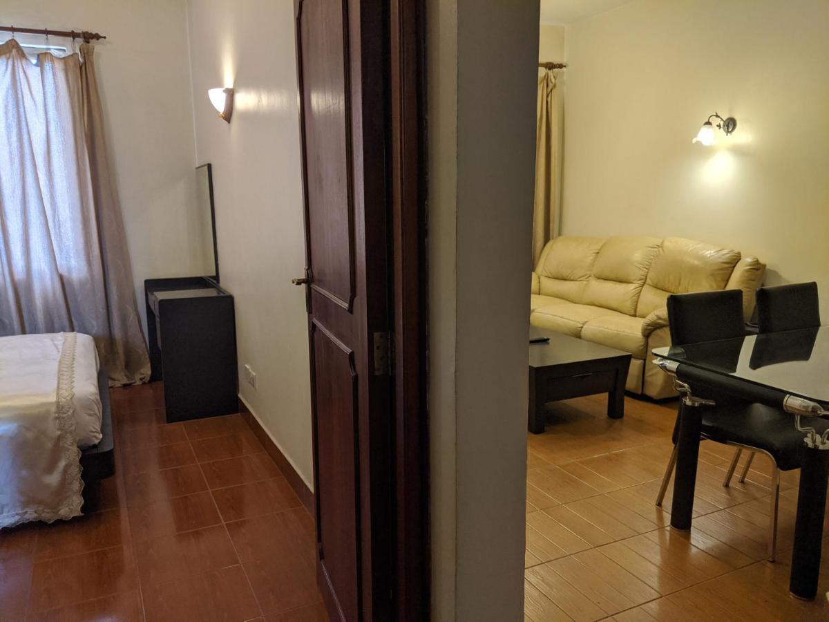 Prestige Hotel Suites Кампала Экстерьер фото
