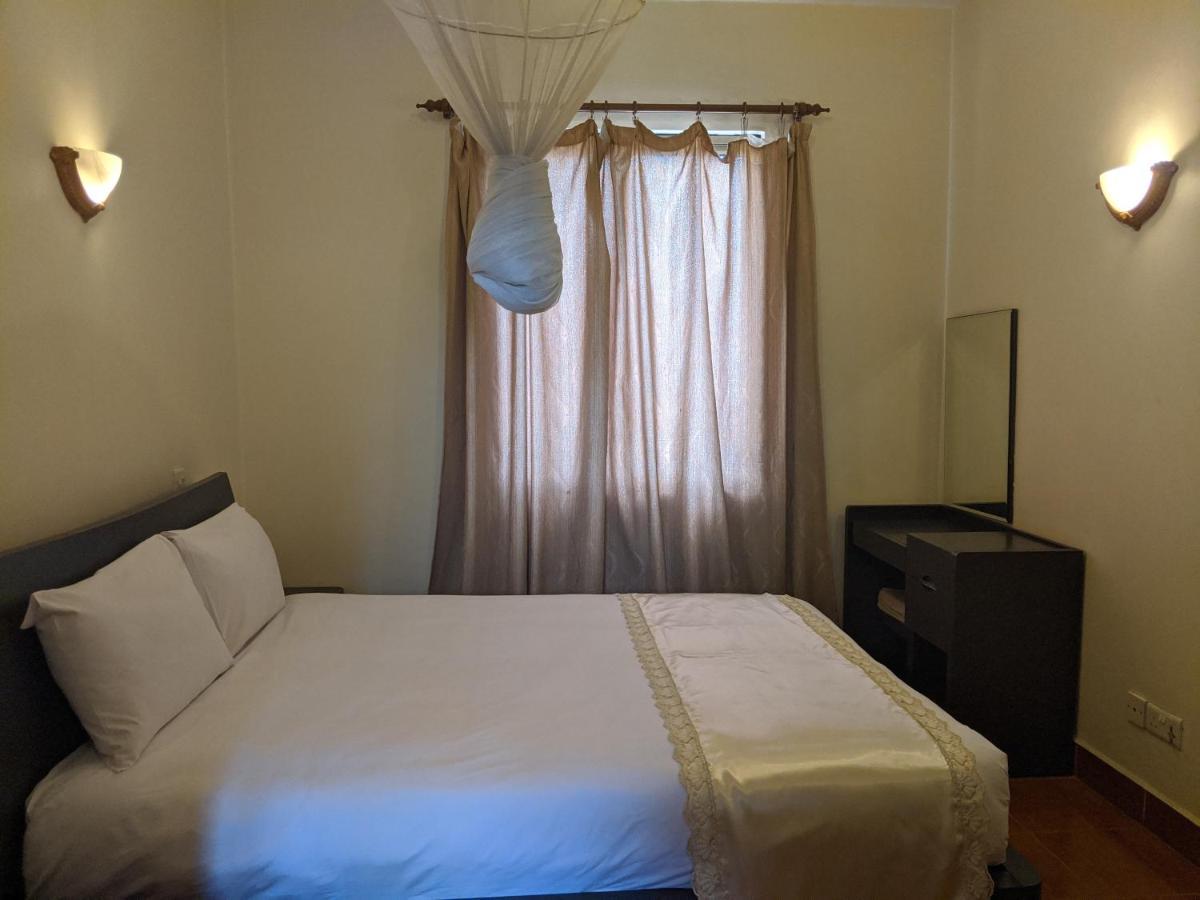 Prestige Hotel Suites Кампала Экстерьер фото