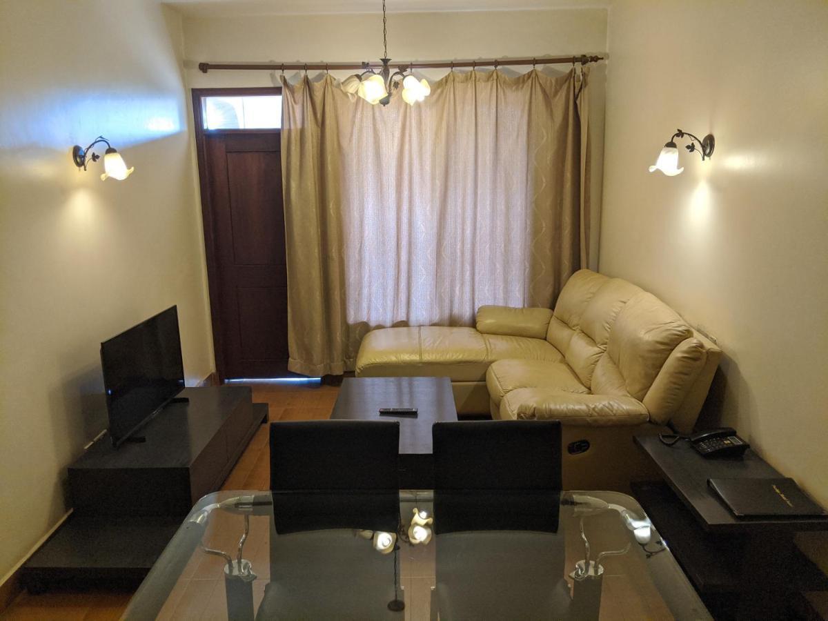 Prestige Hotel Suites Кампала Экстерьер фото