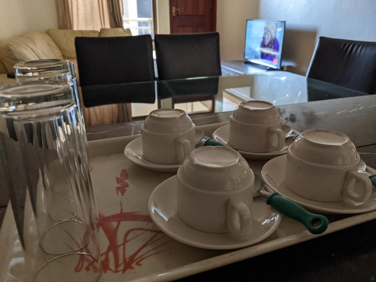 Prestige Hotel Suites Кампала Экстерьер фото