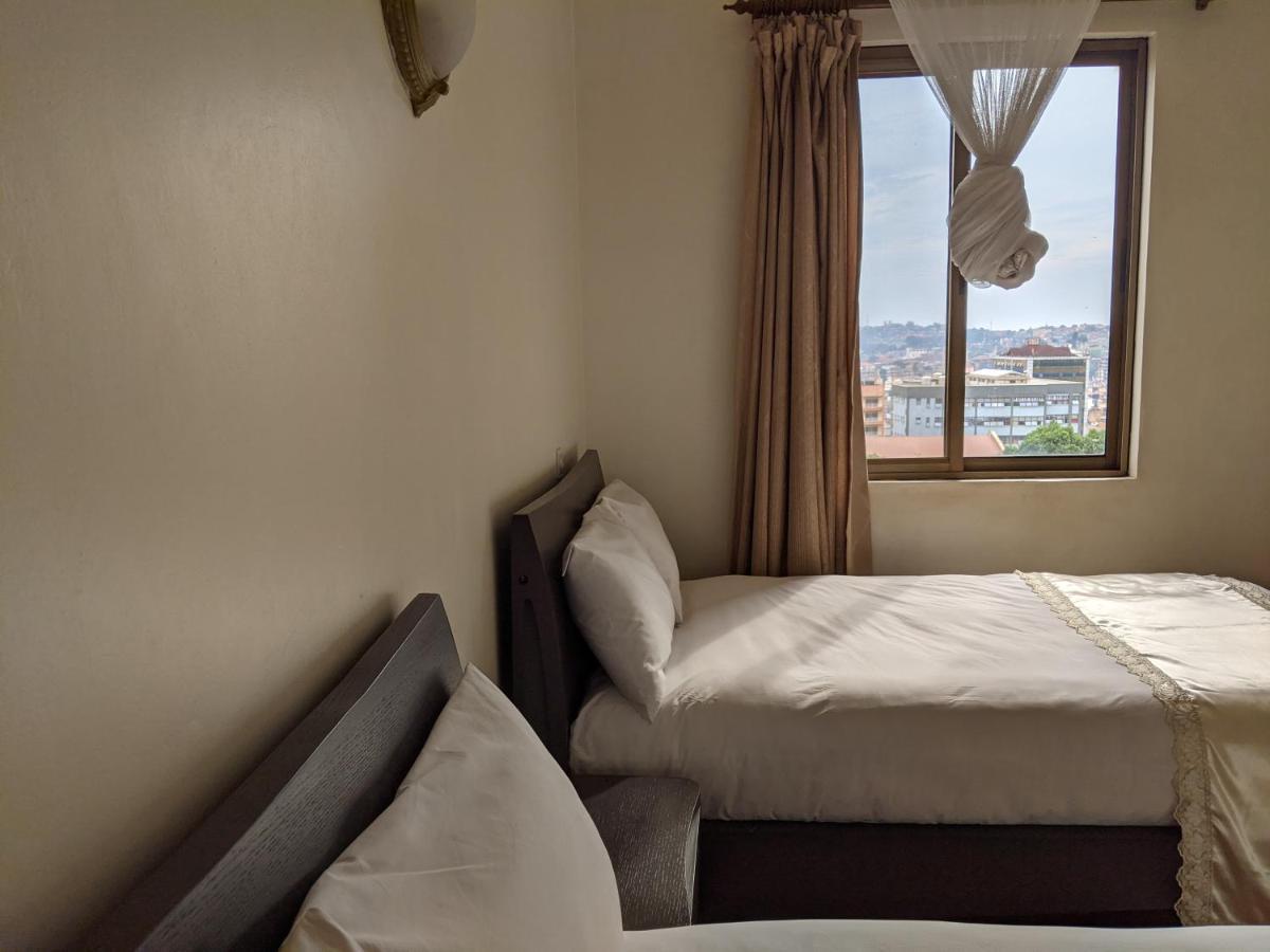 Prestige Hotel Suites Кампала Экстерьер фото