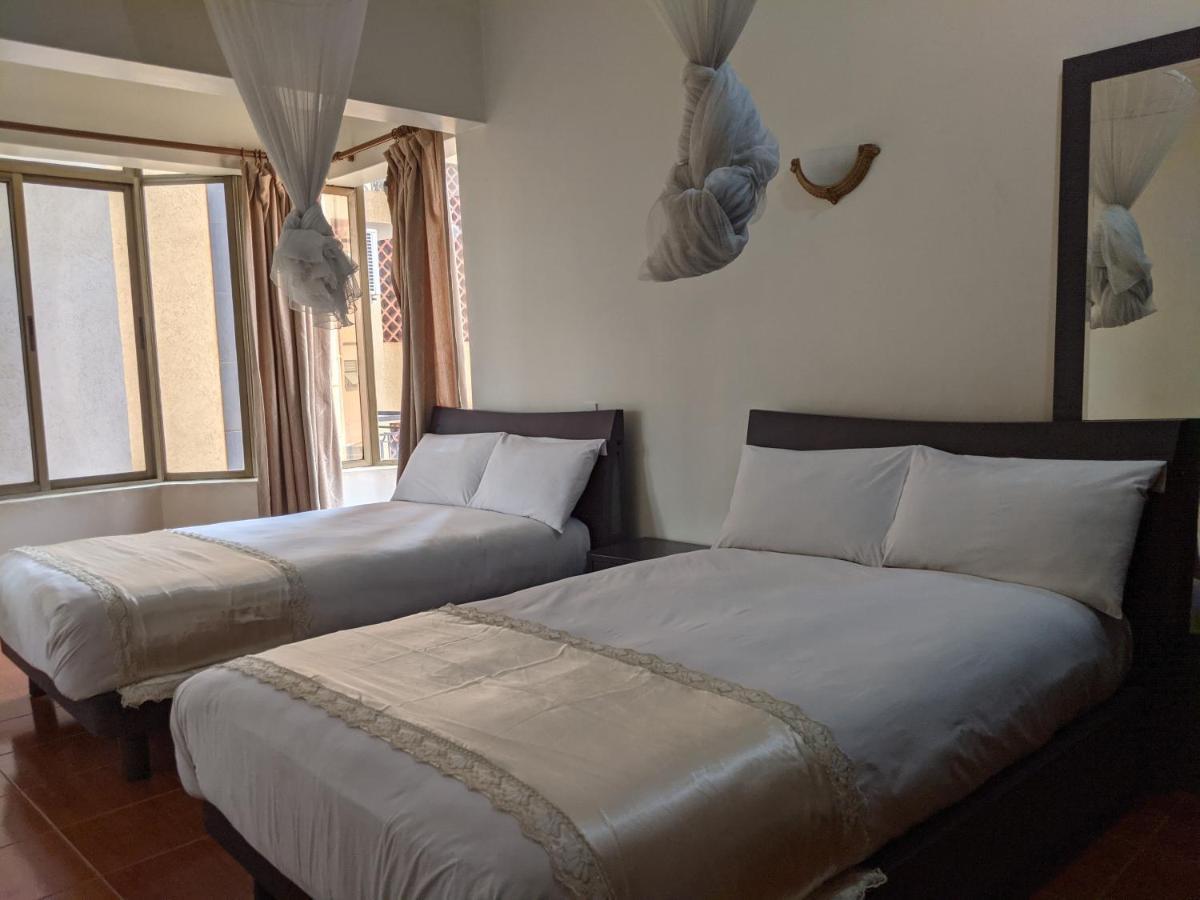 Prestige Hotel Suites Кампала Экстерьер фото