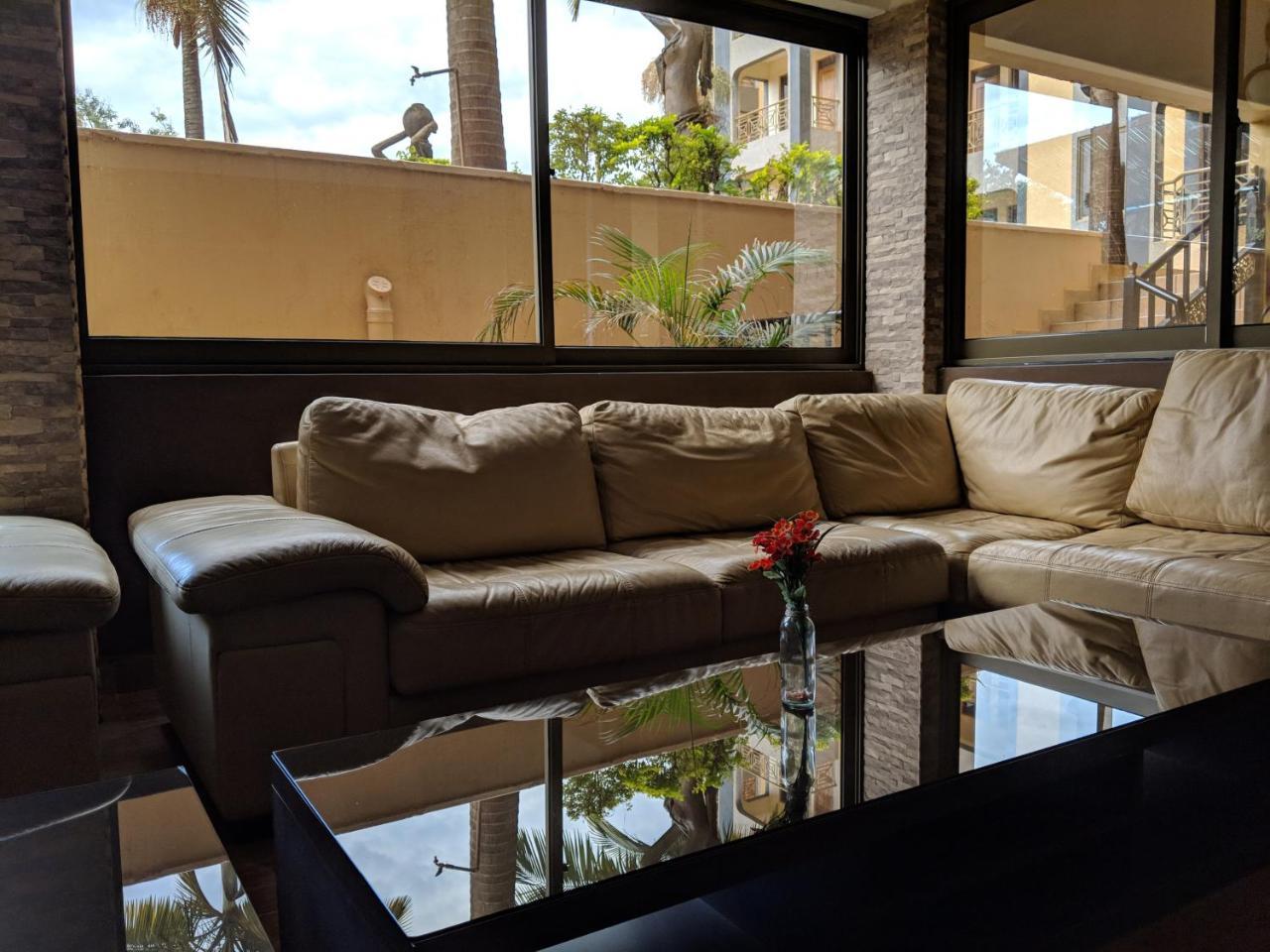 Prestige Hotel Suites Кампала Экстерьер фото