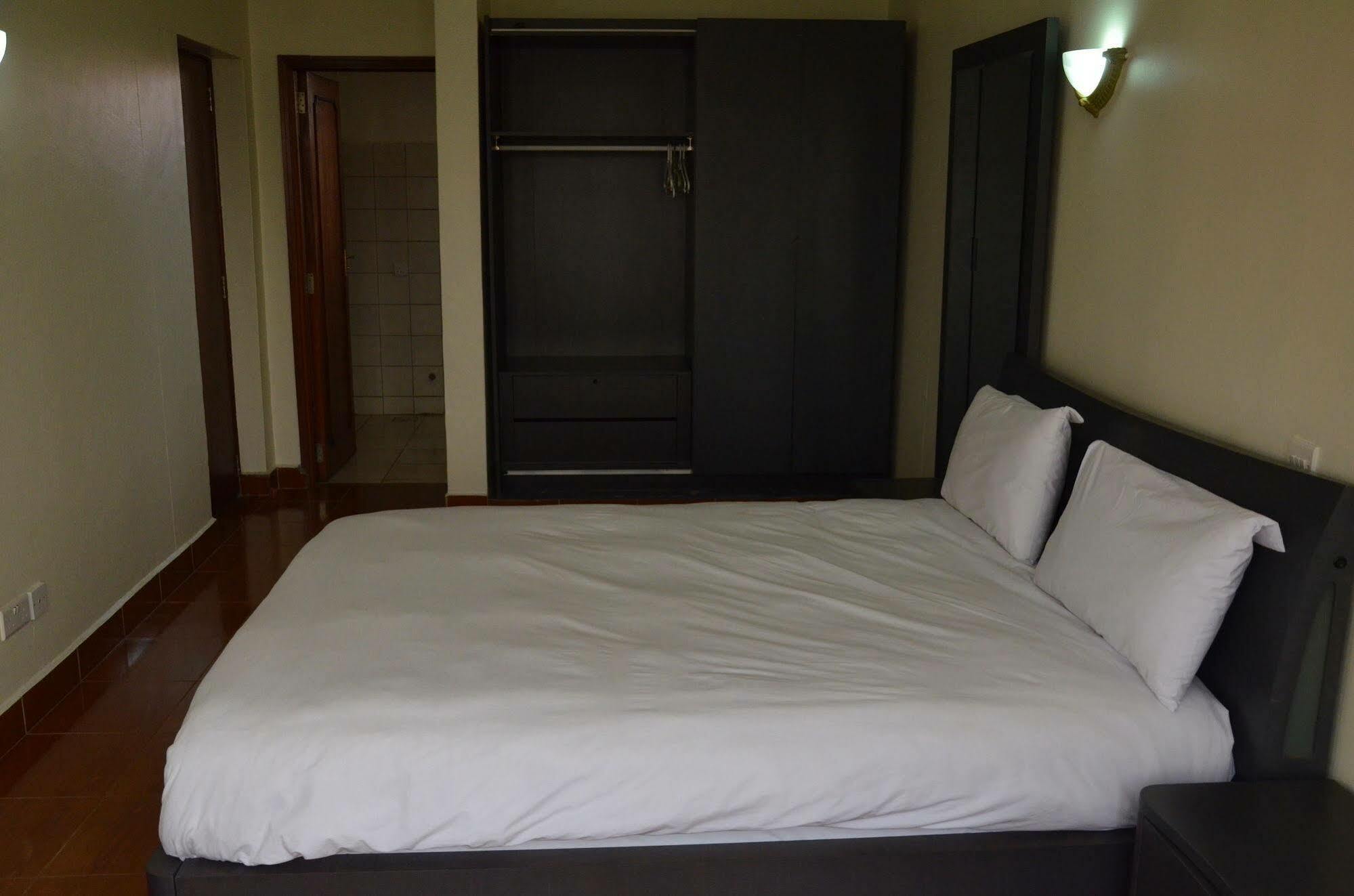 Prestige Hotel Suites Кампала Экстерьер фото